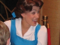 Signing autographs as 'peasant Belle.'